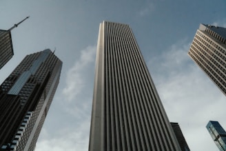 a group of tall buildings in a city