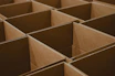 a lot of brown boxes that are open