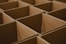 a lot of brown boxes that are open