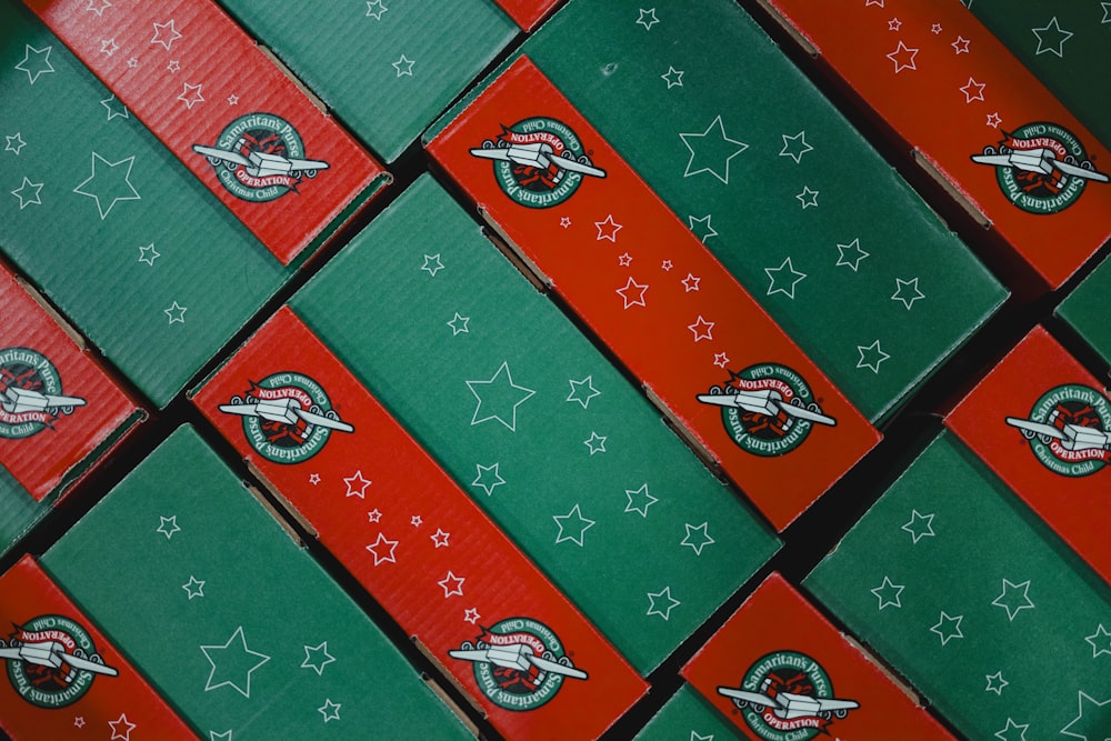 a bunch of green and red boxes with stars on them