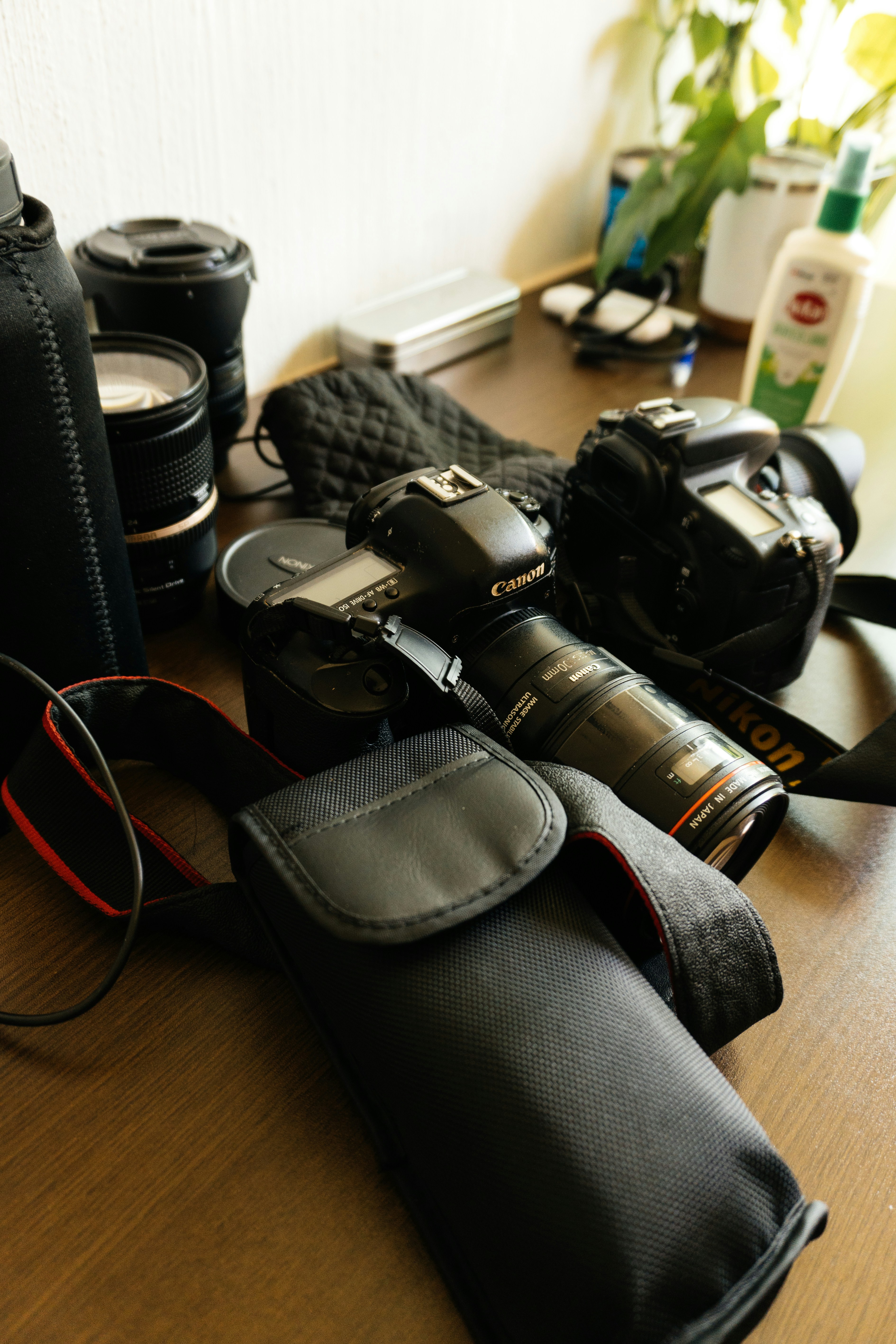 a camera and some other items on a table