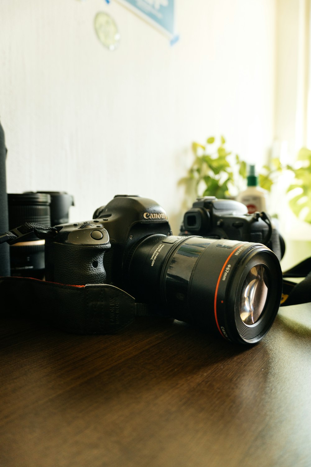 a camera sitting on top of a wooden table