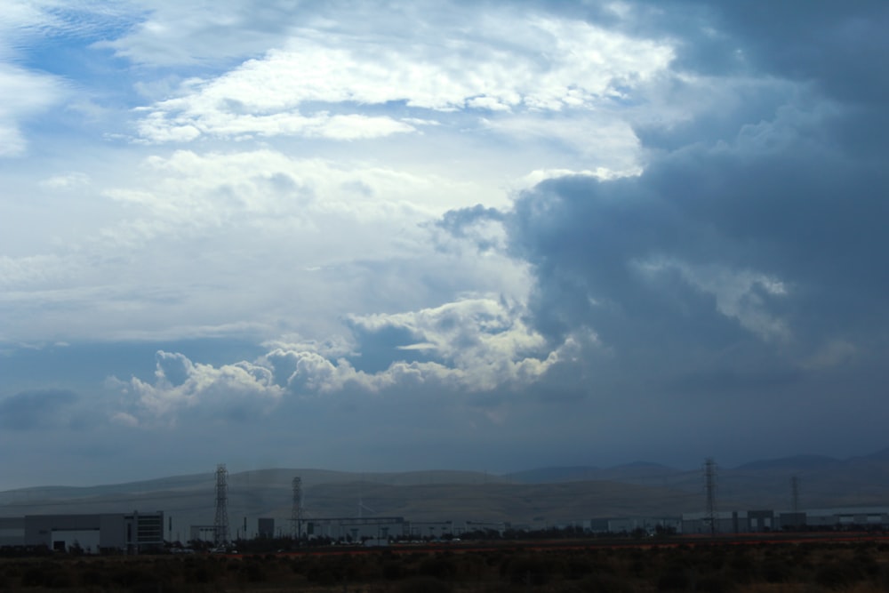 a view of the sky with clouds in the background