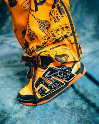 Before and after shots of a sneaker transformed with bold colors and patterns.