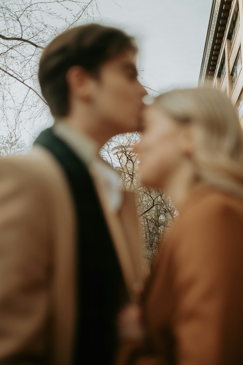 a man and a woman standing next to each other