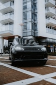 A sleek black Range Rover parked in an urban setting.