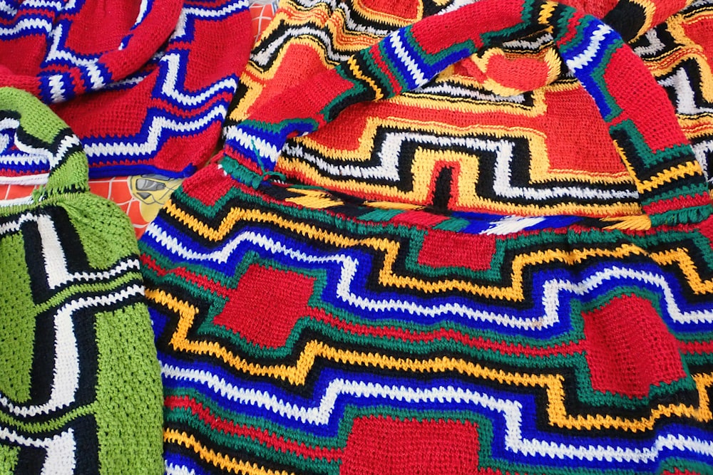 a close up of a colorful blanket on a table