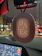 A cozy car interior with a Maison Brume spray bottle on the dashboard.