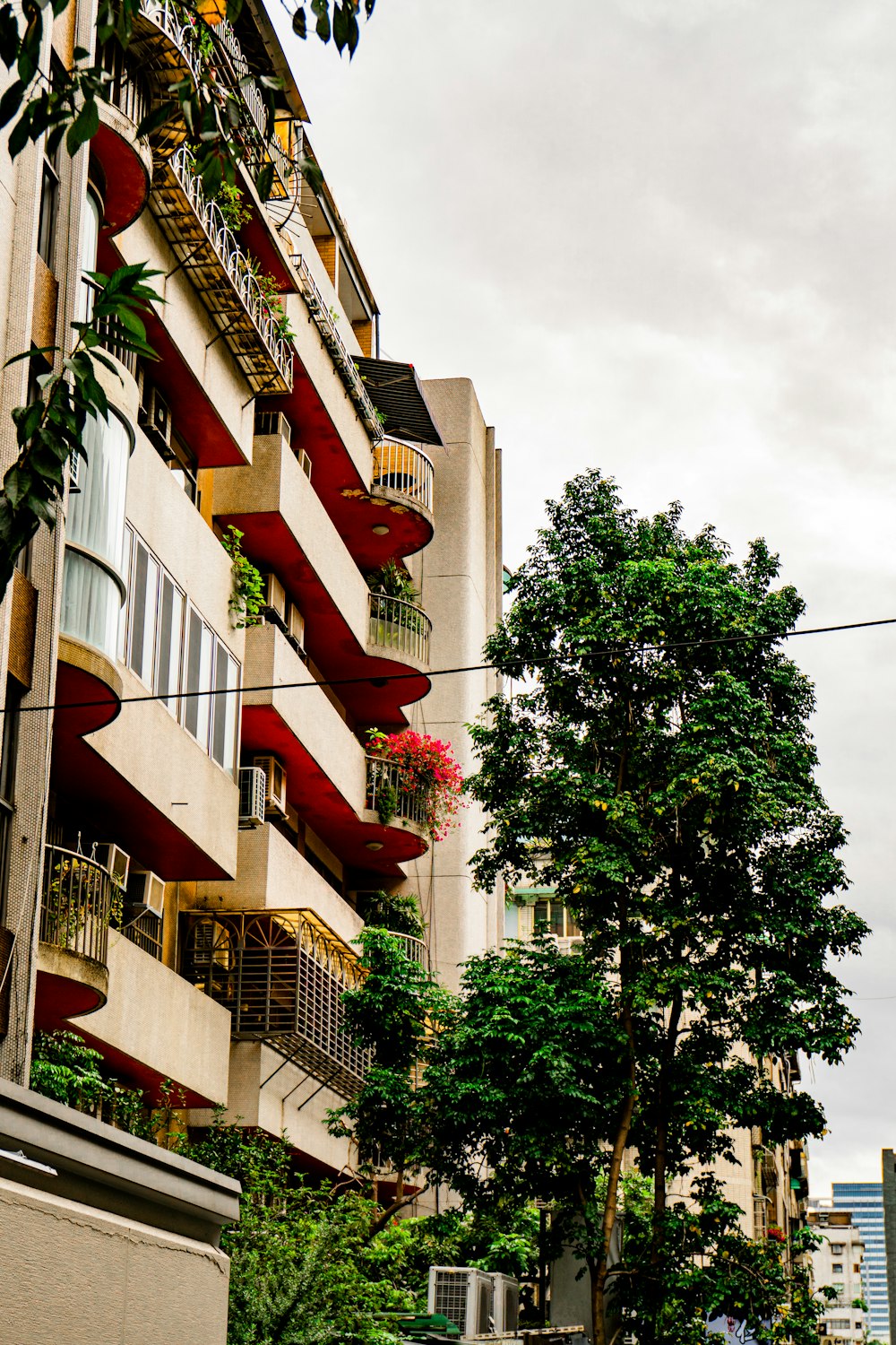 an apartment building with balconies and balconies on the balconies