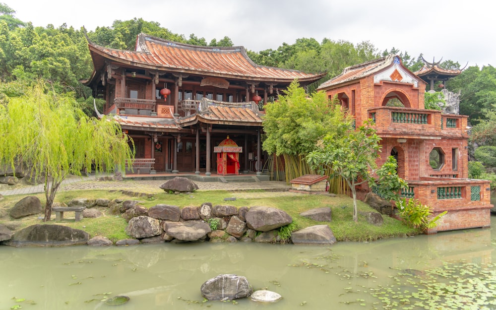 a building with a pond in front of it