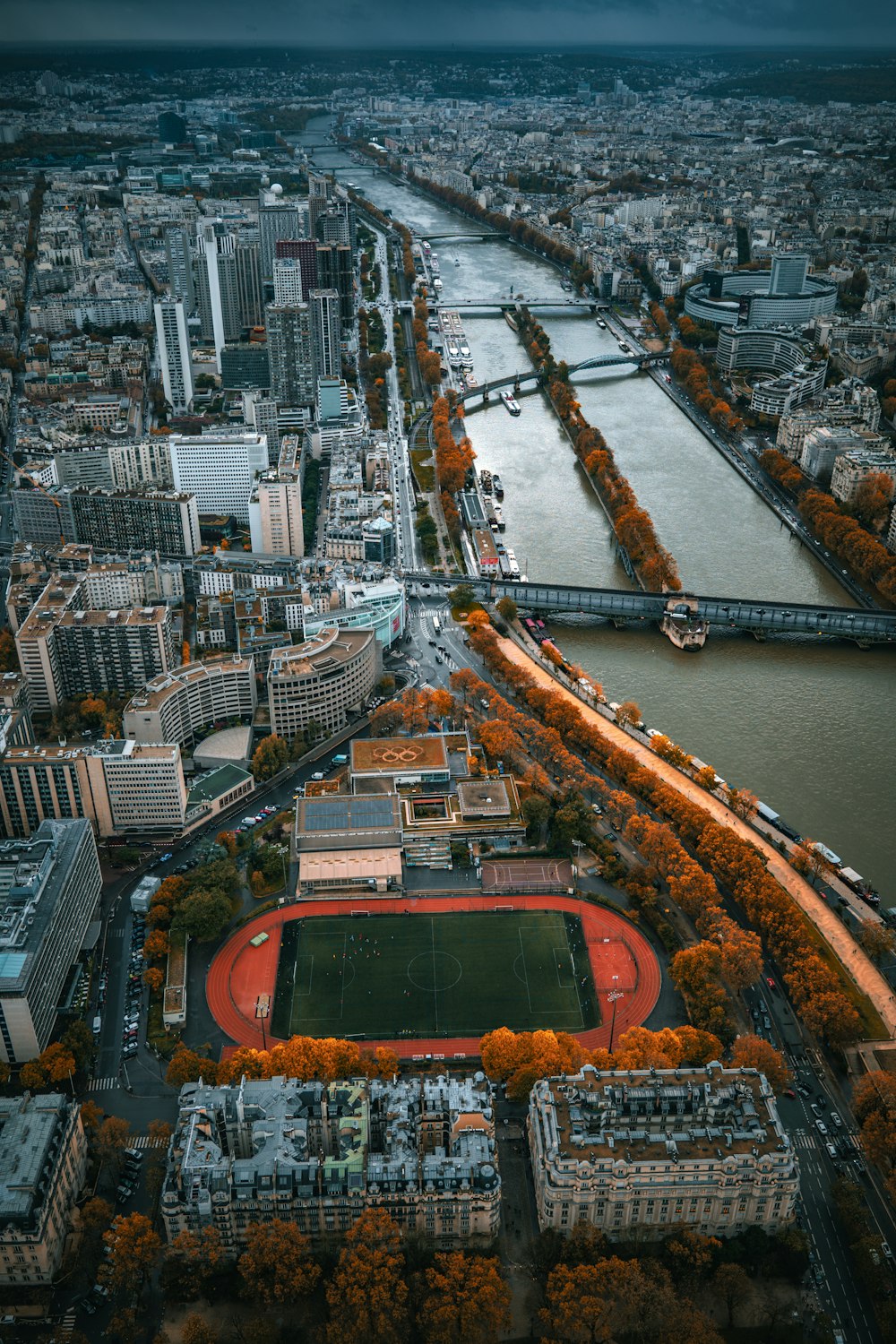 an aerial view of a city with a river running through it