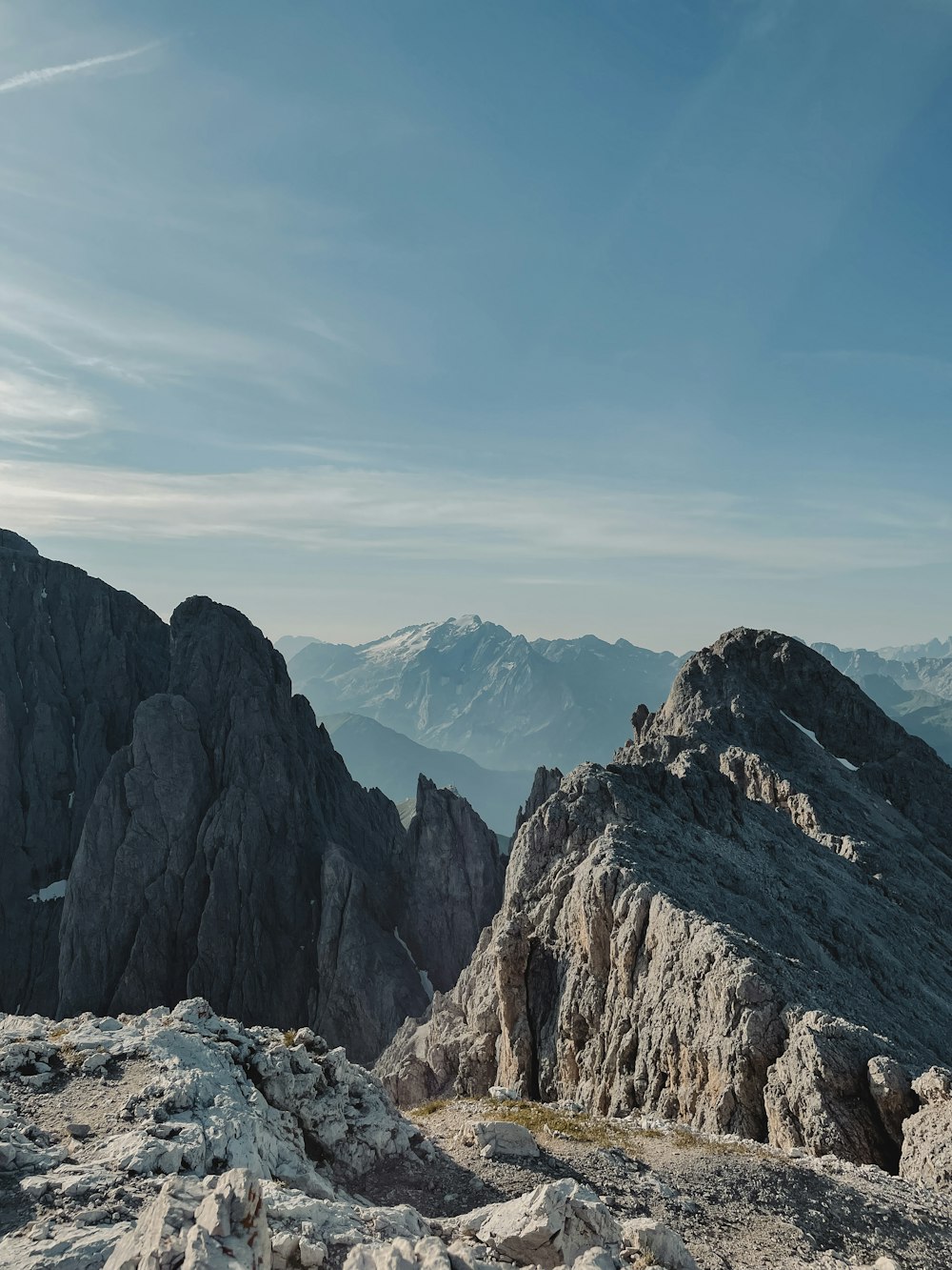 a view of a mountain range from the top of a mountain