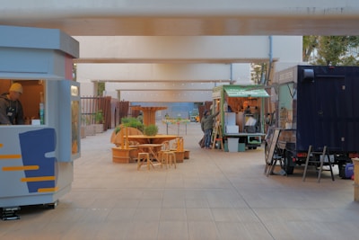 A vibrant food market set up in an underused land area.