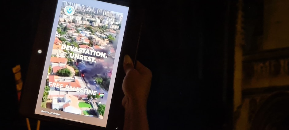 A close-up of a computer screen displaying social media posts with hateful comments, symbolizing online antisemitism.