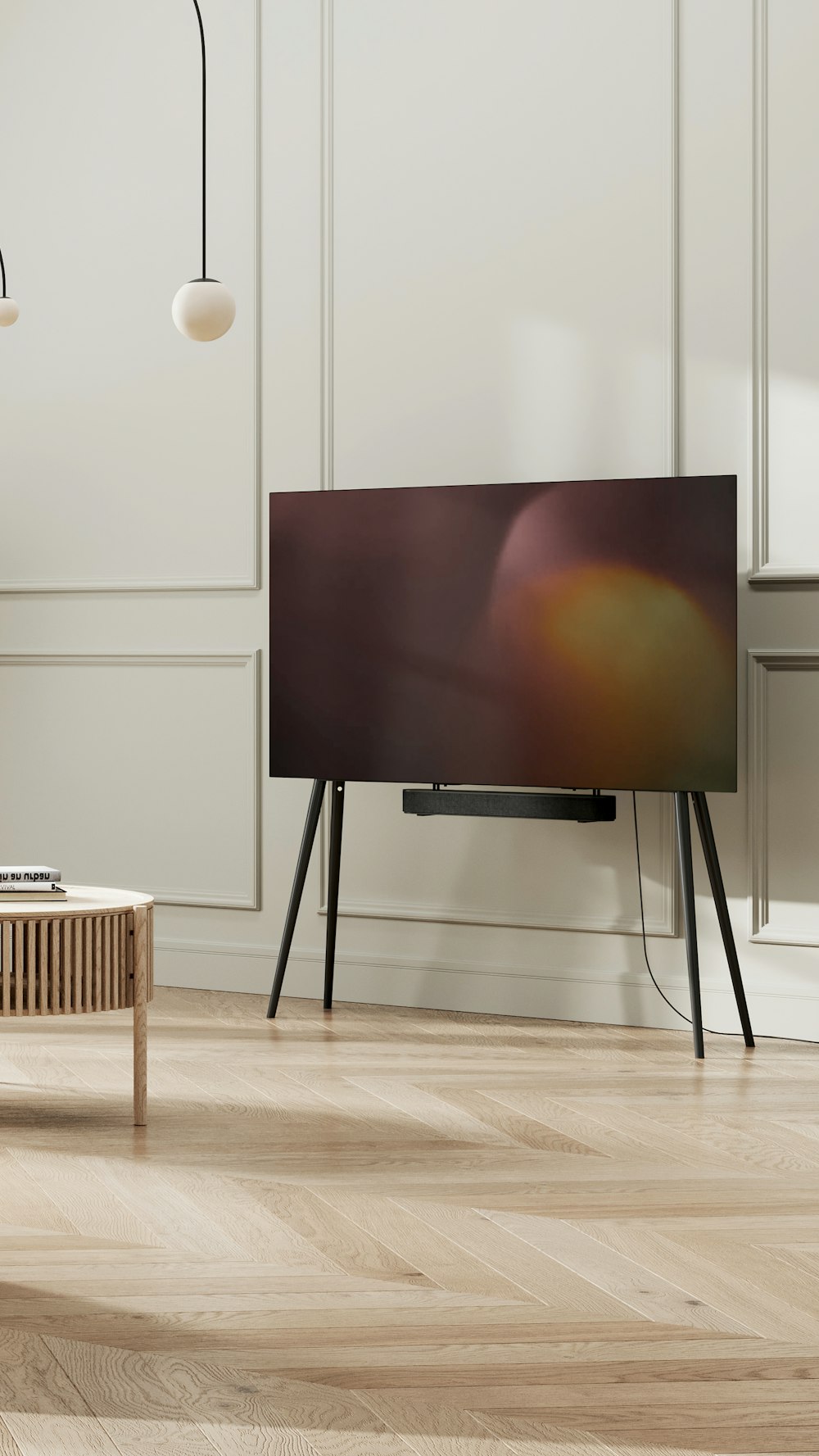 a flat screen tv sitting on top of a wooden table