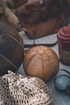 a group of leather balls sitting on top of a table