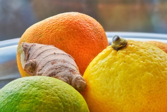 Close-up of fresh fruits and herbal supplements on a wooden table.