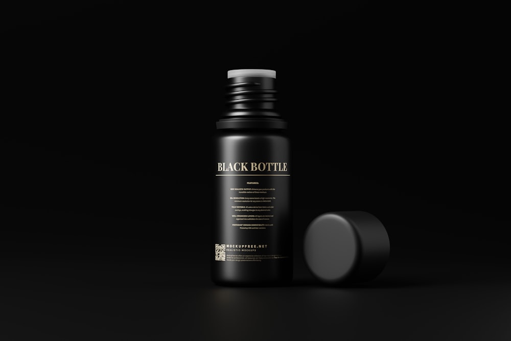 a bottle of black bottle on a black background