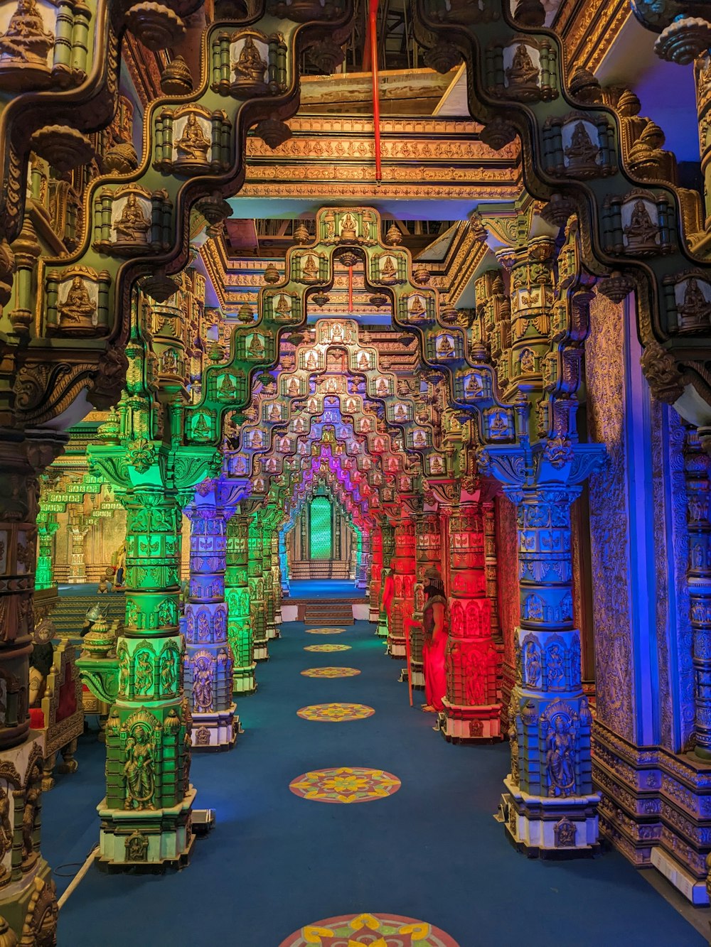 a hallway with a lot of colorful lights on it