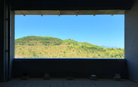 a view of a mountain from a window