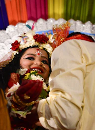 A vibrant scene of a family joyfully celebrating an Indian festival with colorful decorations and traditional attire.