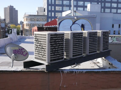 a large air conditioner sitting on top of a roof