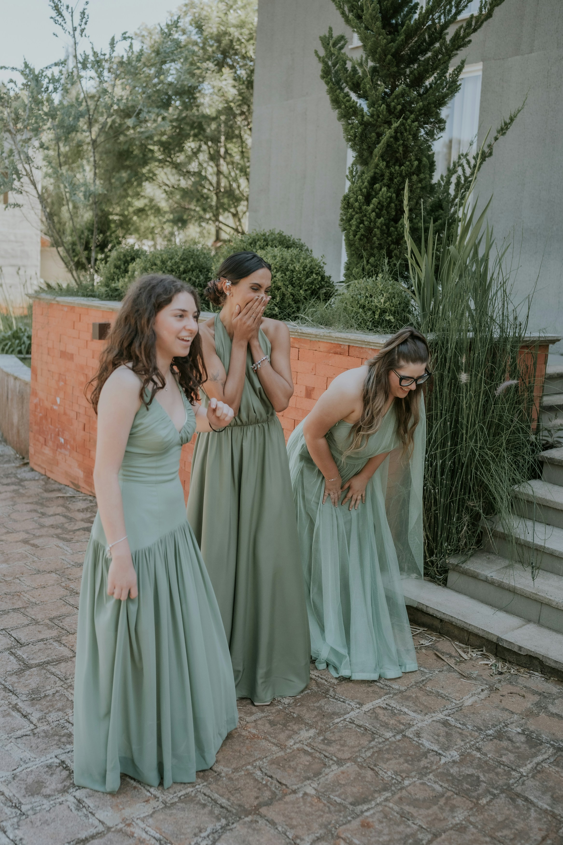 a group of women standing next to each other