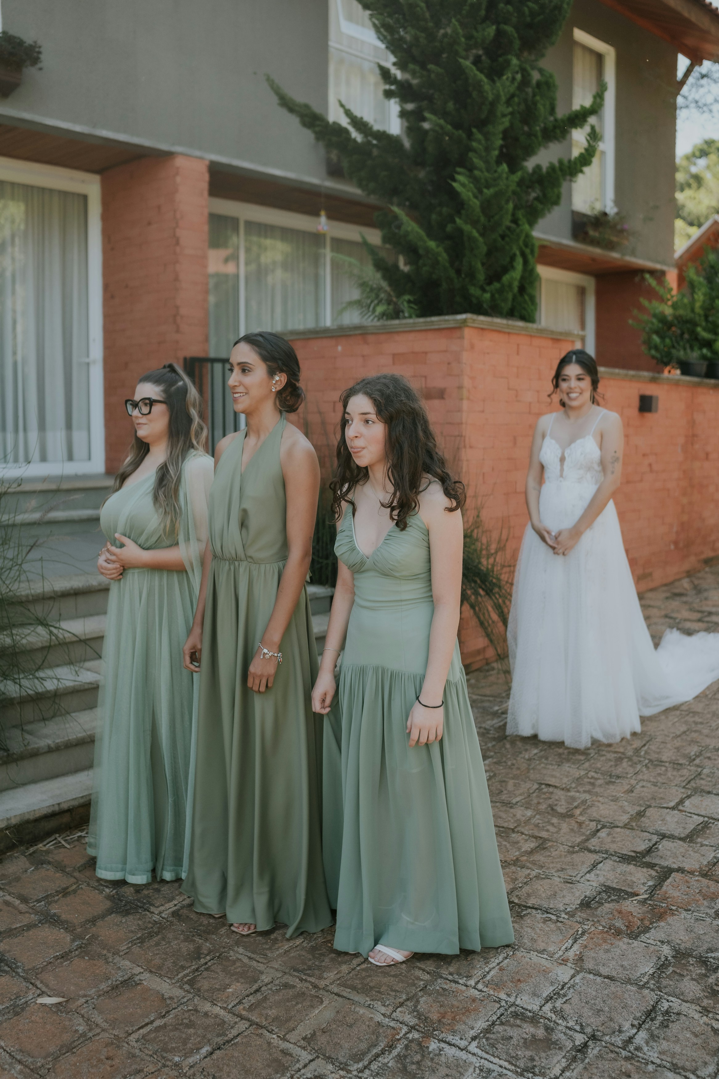 a group of women standing next to each other