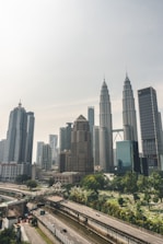 a view of a city with tall buildings