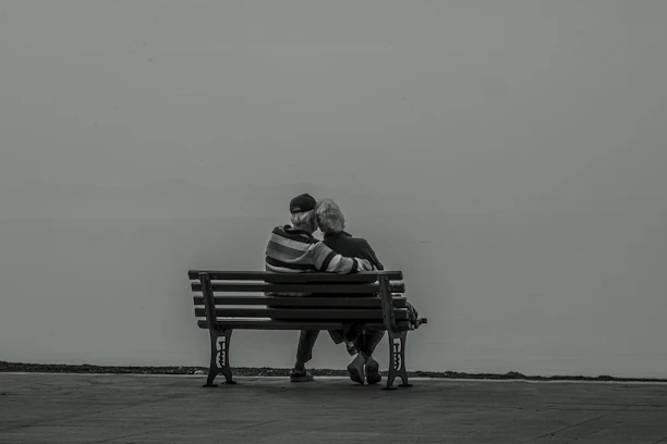 A serene scene of a retired couple reviewing their financial plans together at home.