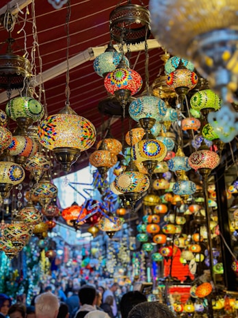 A colorful market scene in Dubai with traditional lanterns and spices.
