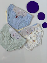 Close-up of colorful, comfortable children's underwear with simple, cute patterns.