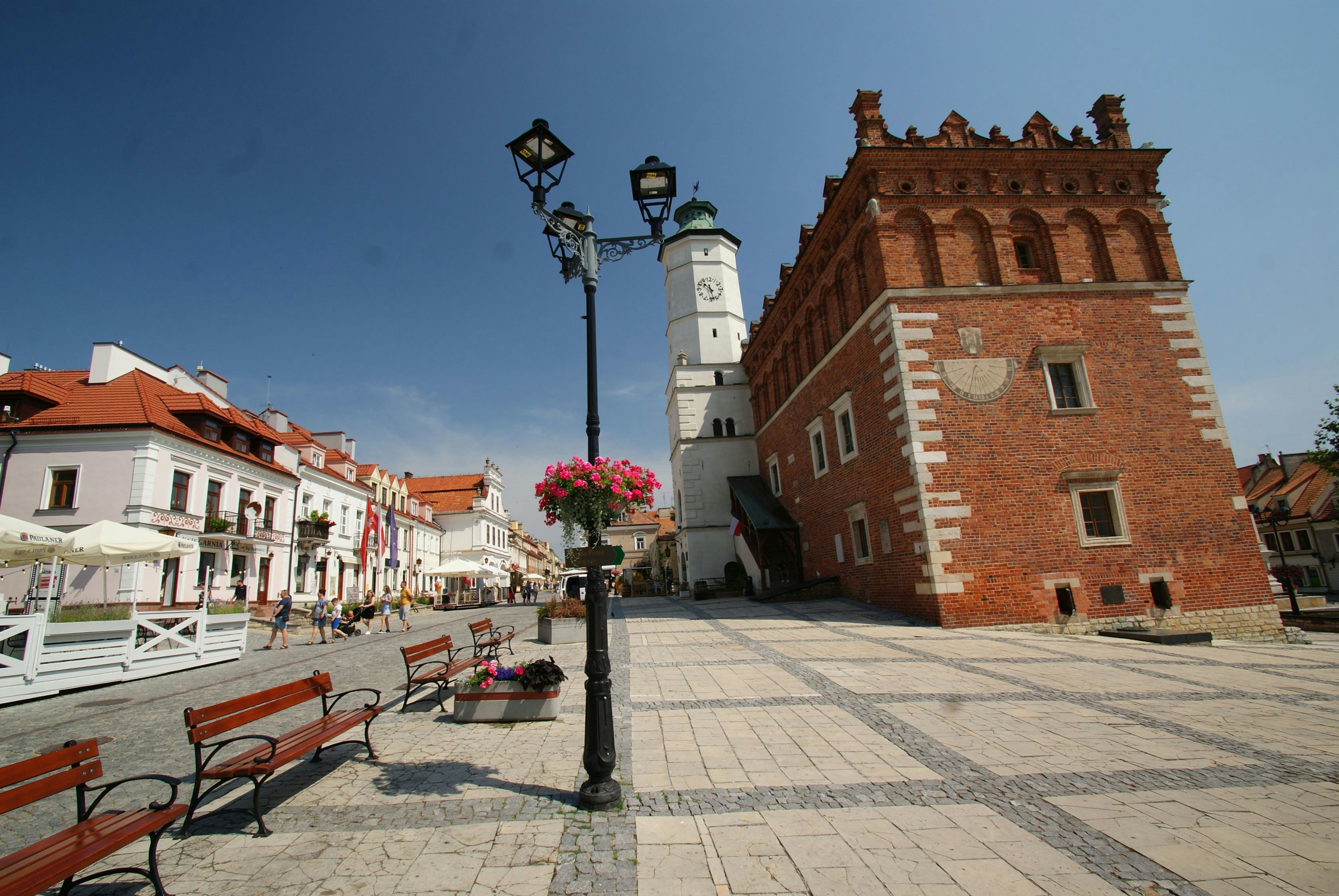 a clock tower in the middle of a town