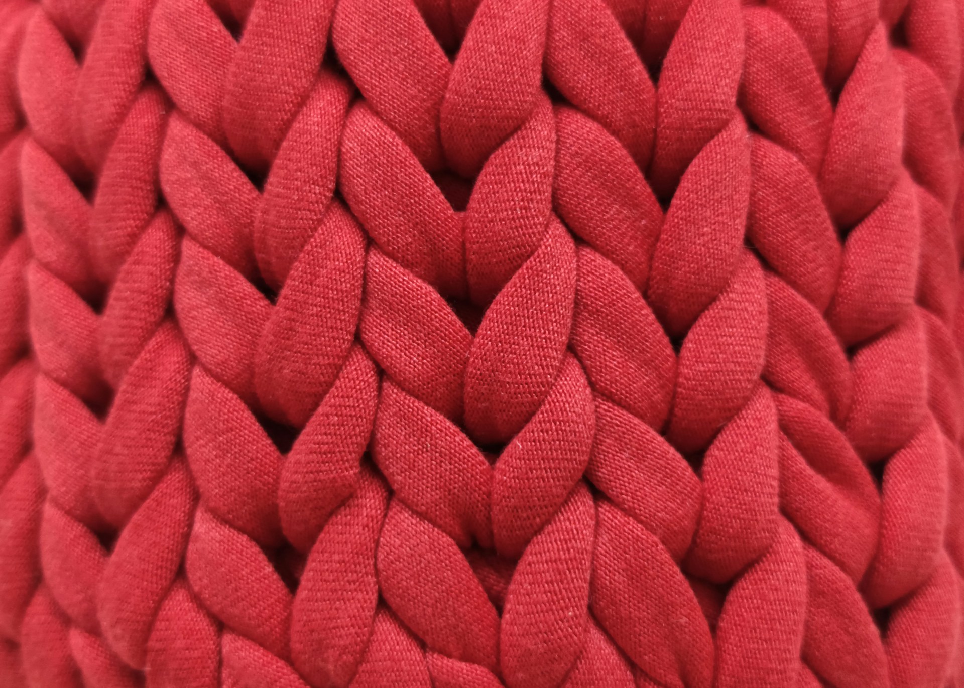 a close up view of a red pillow