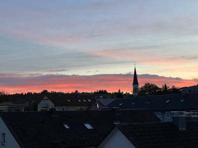 A peaceful sunset over a small church building in the Argentine countryside