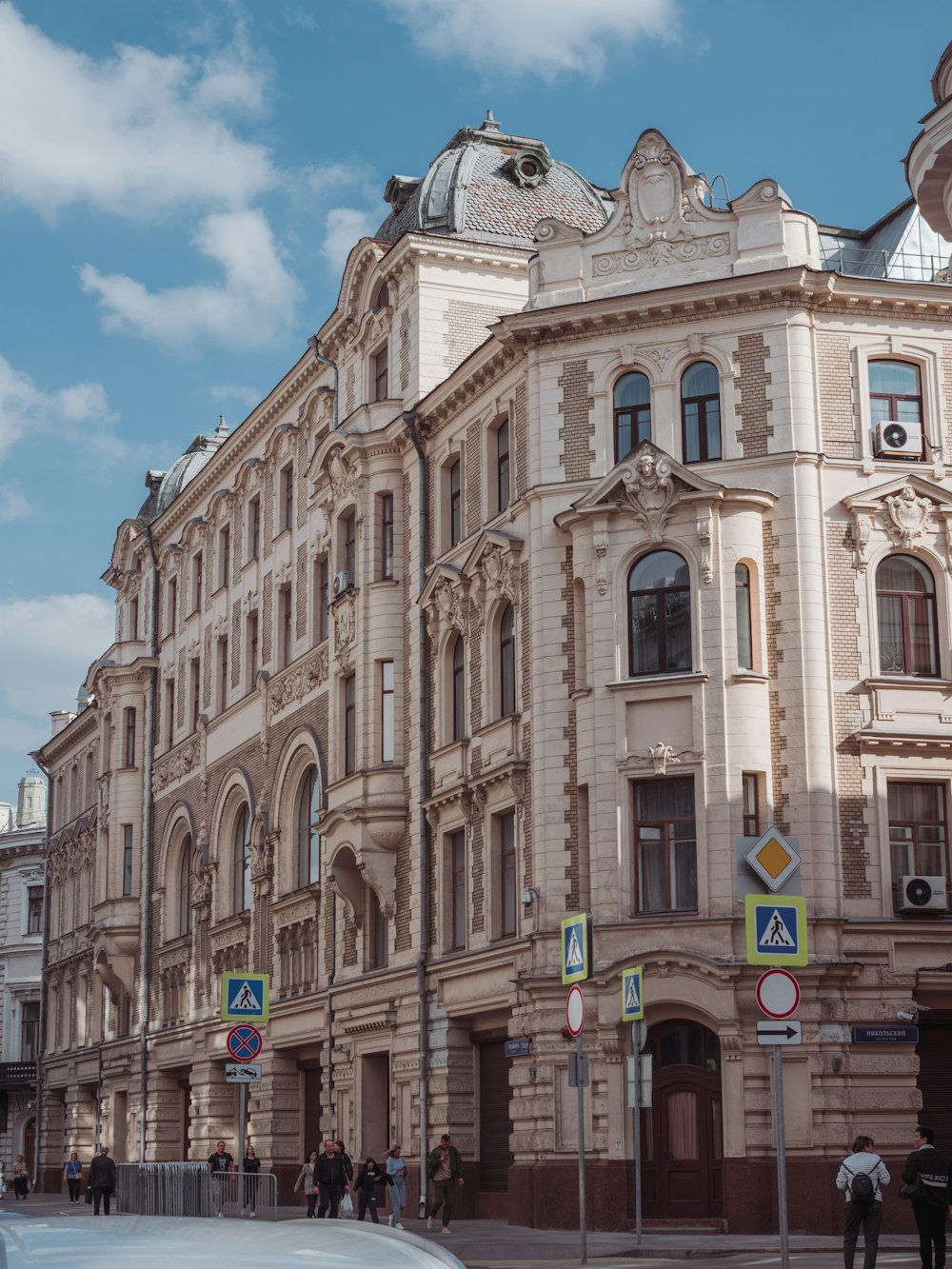 a large building with a clock on the top of it