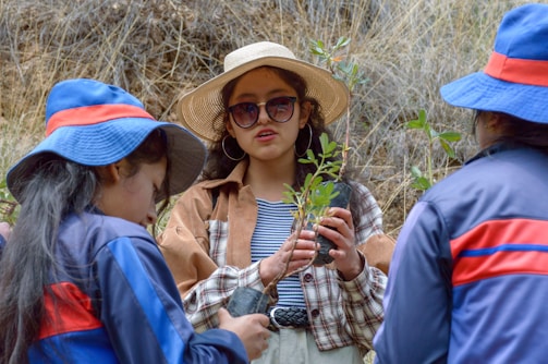 Participants planting native drought-tolerant species during a field trip in a dryland garden.