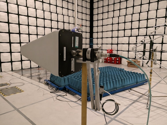 Laboratory setup with researchers testing electromagnetic devices.