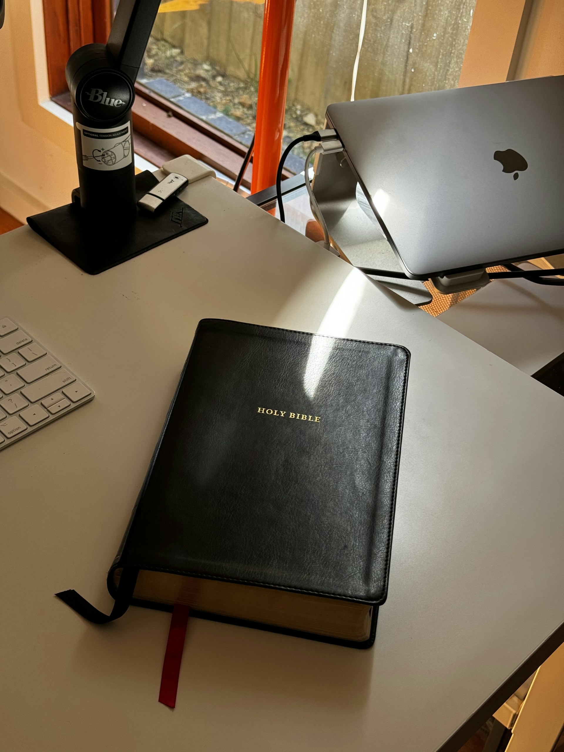 black and brown leather padded tub sofa