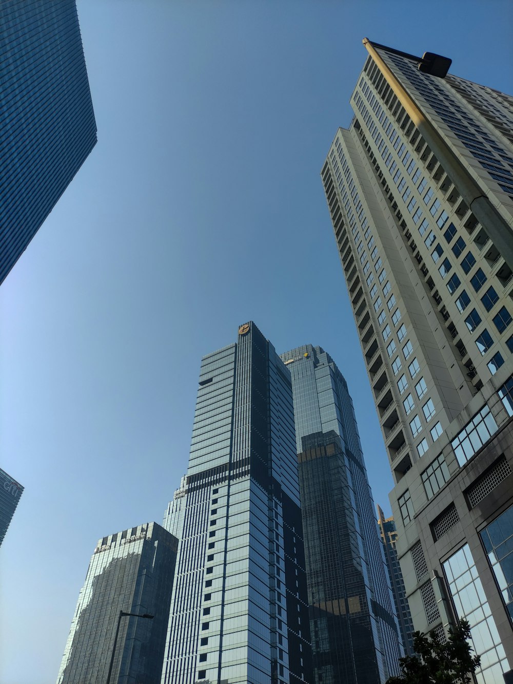 a group of tall buildings in a city