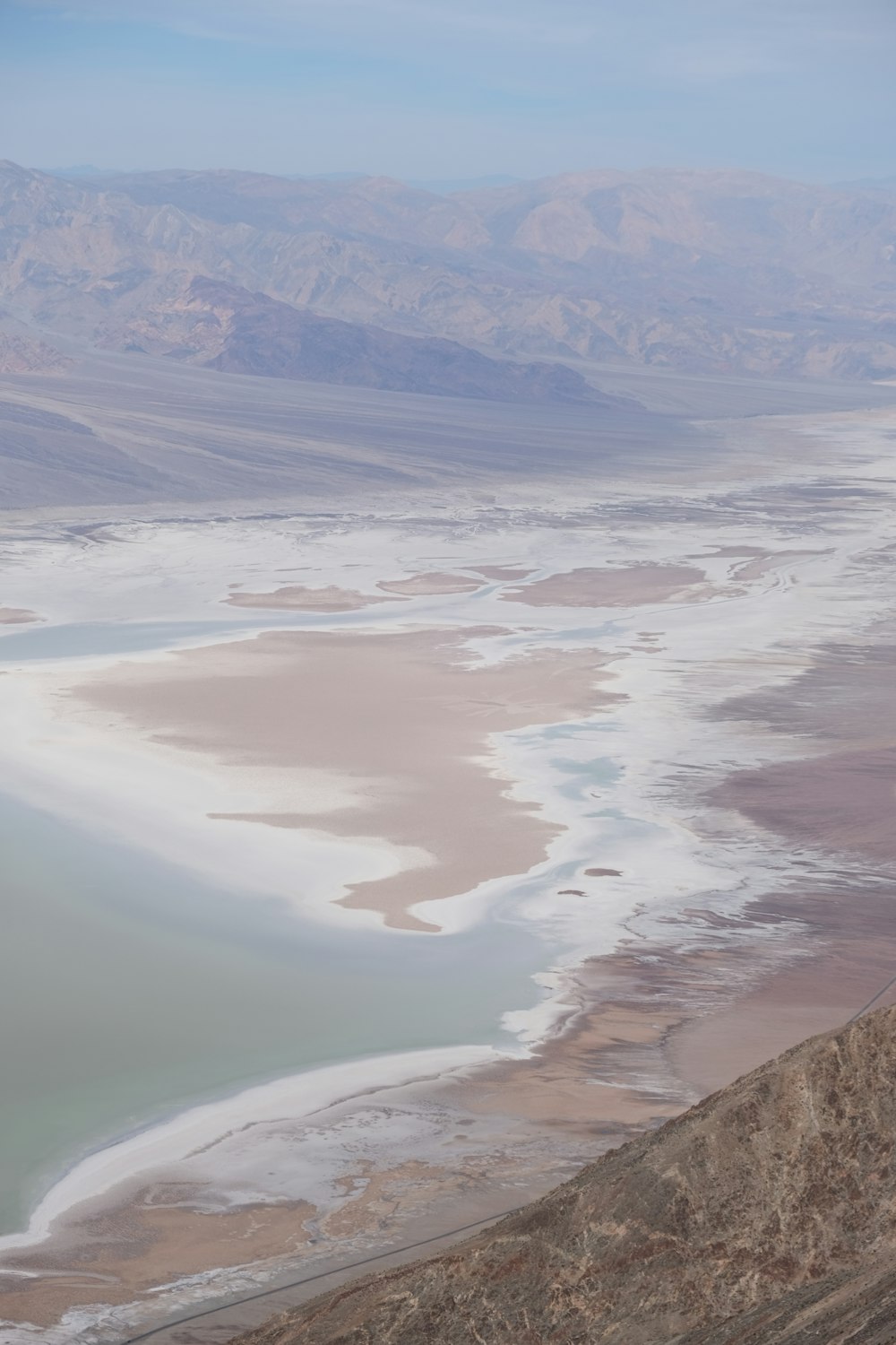 a large body of water surrounded by mountains