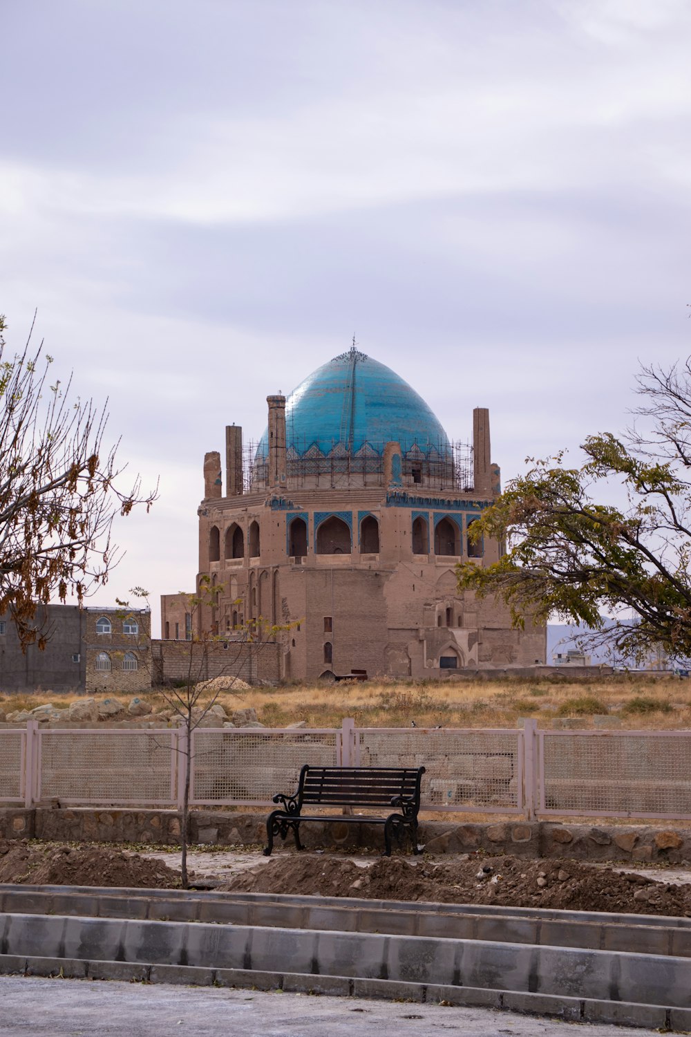 a large building with a blue dome on top of it