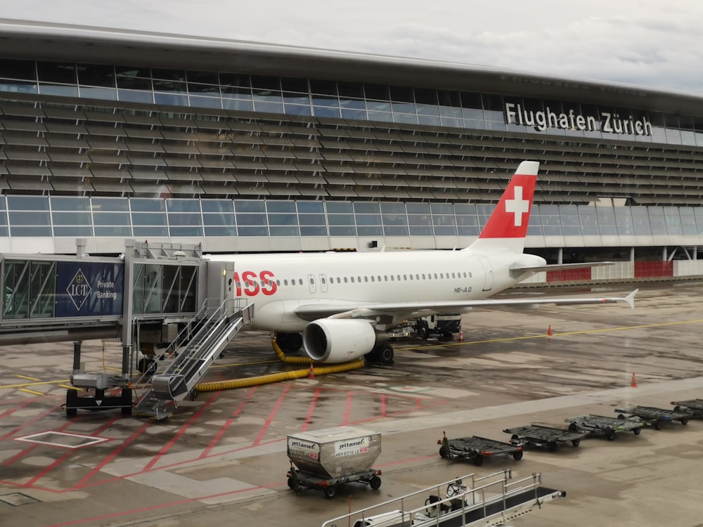 a large jetliner sitting on top of an airport tarmac