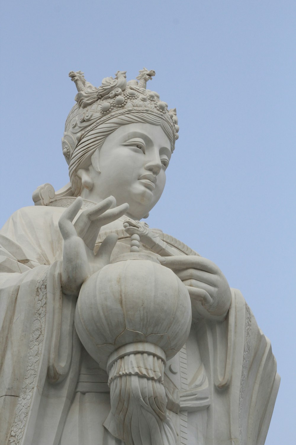 a statue of a woman with a crown on her head