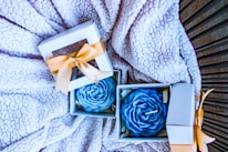 Elegant rose-shaped candles displayed beautifully.