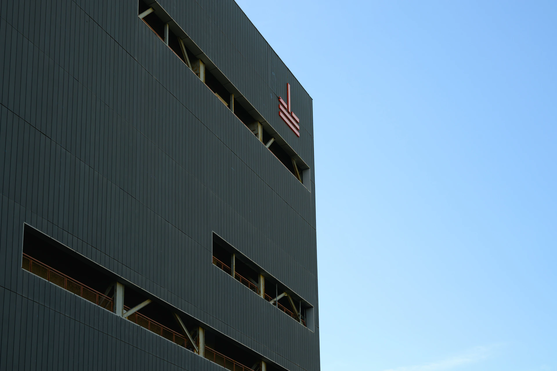 woman wearing yellow long-sleeved dress under white clouds and blue sky during daytime