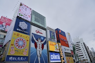 a bunch of billboards in a big city
