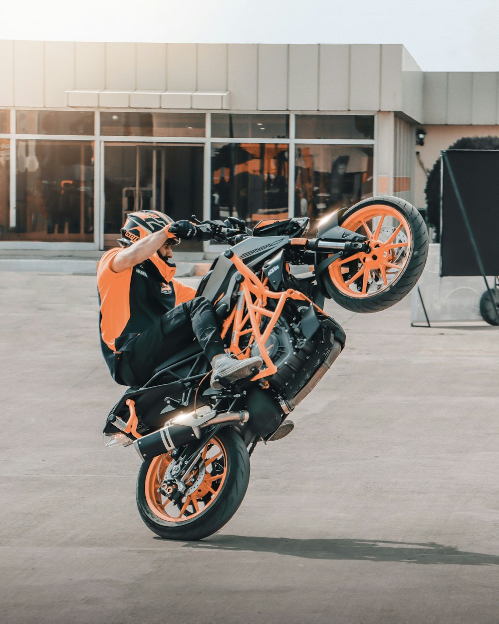 a person doing a trick on a motorcycle