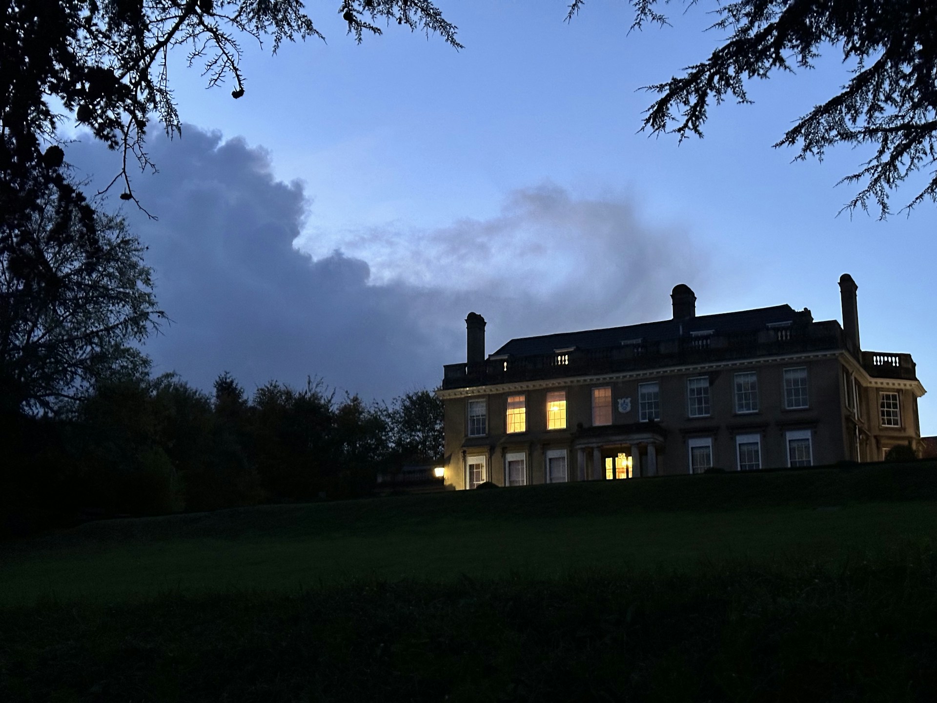 woman wearing yellow long-sleeved dress under white clouds and blue sky during daytime