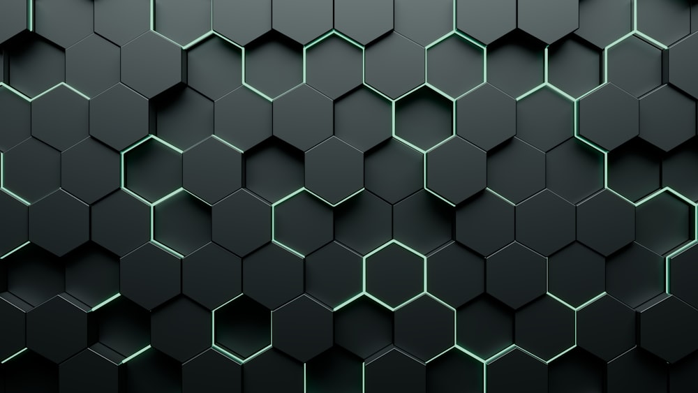 a black and green background with hexagonal shapes